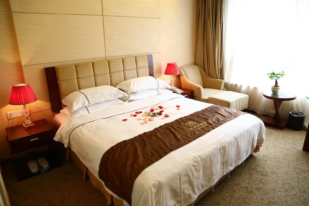 Long Zhou Grand Hotel Guangzhou Rum bild