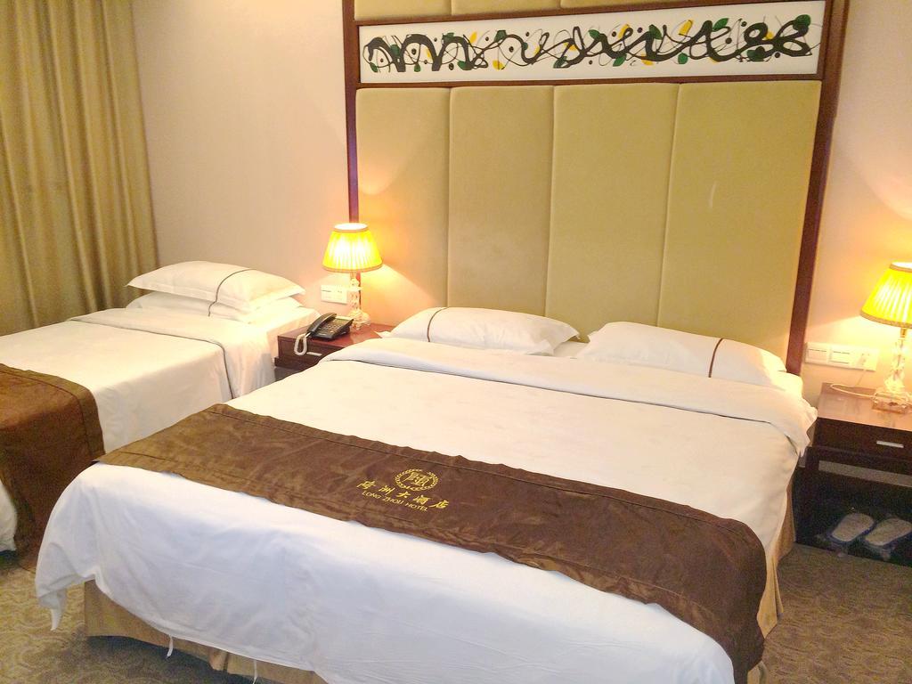 Long Zhou Grand Hotel Guangzhou Rum bild