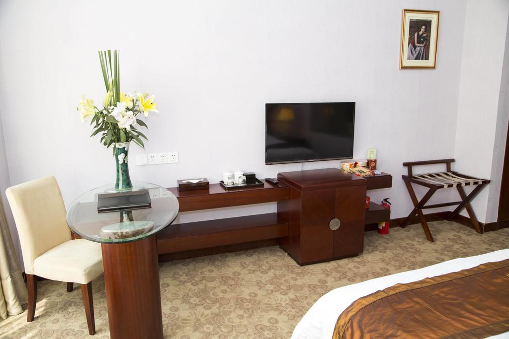 Long Zhou Grand Hotel Guangzhou Rum bild