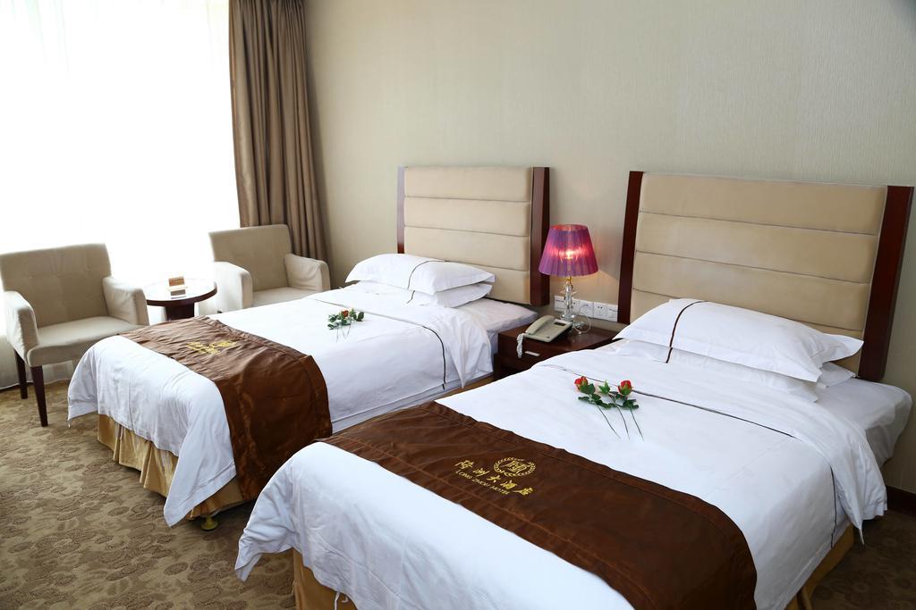 Long Zhou Grand Hotel Guangzhou Rum bild