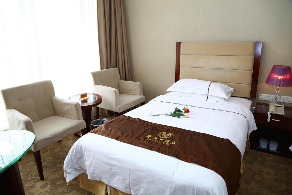 Long Zhou Grand Hotel Guangzhou Rum bild