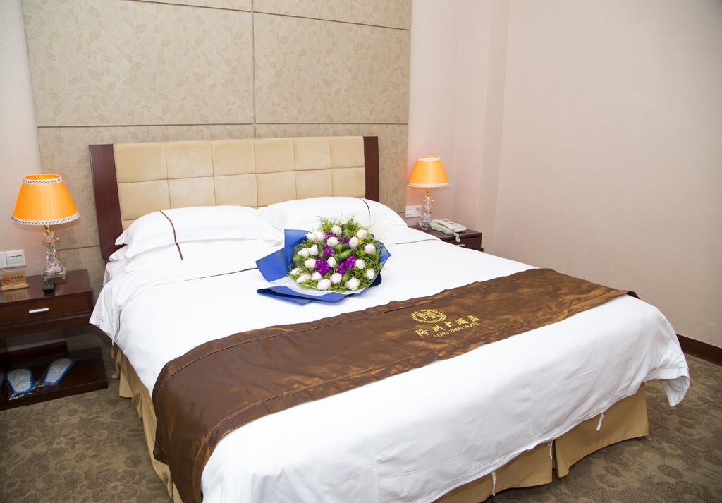 Long Zhou Grand Hotel Guangzhou Rum bild