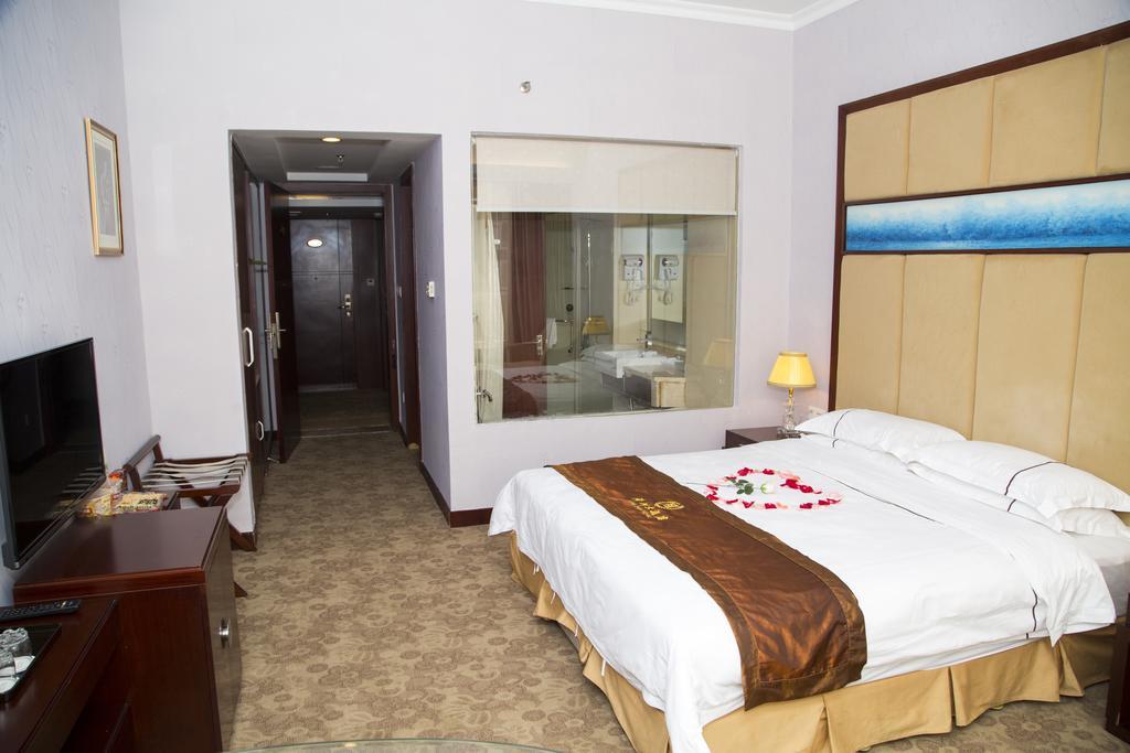Long Zhou Grand Hotel Guangzhou Rum bild