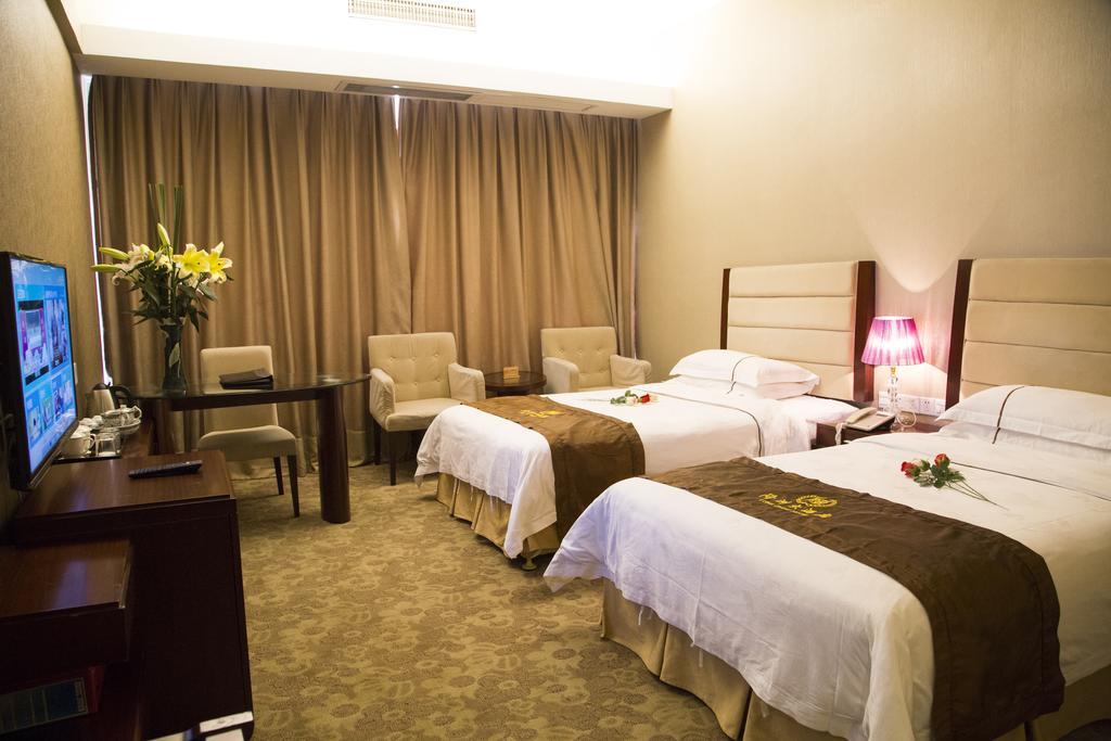 Long Zhou Grand Hotel Guangzhou Rum bild