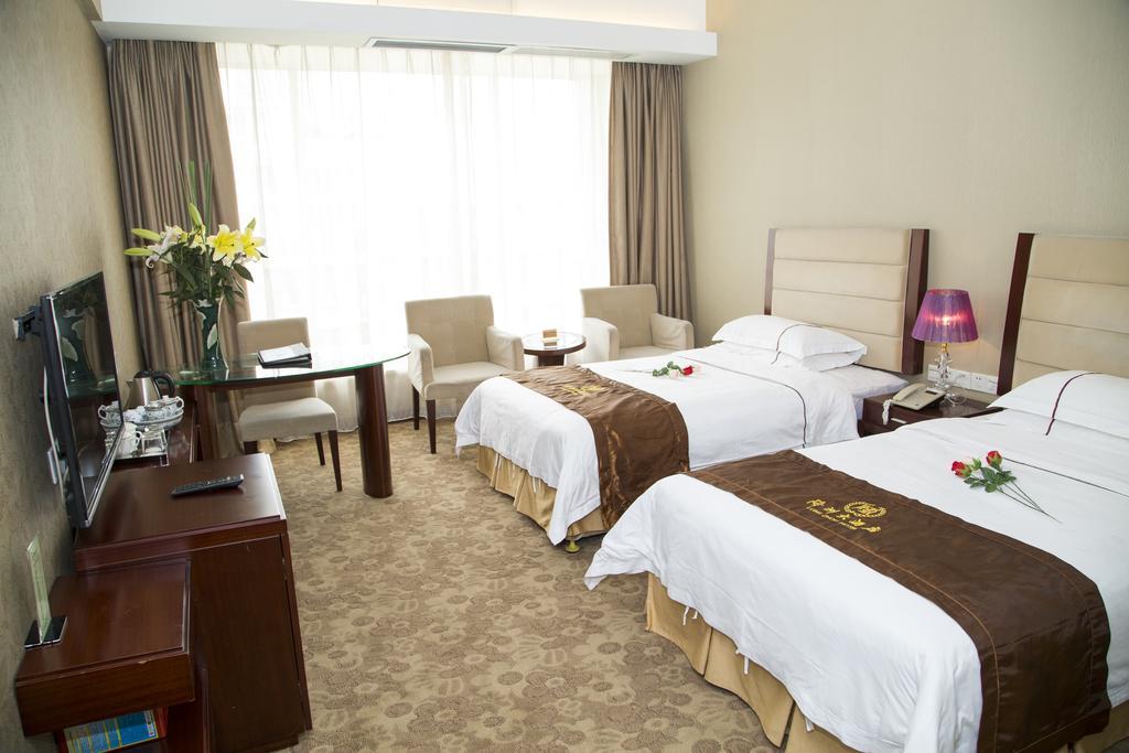 Long Zhou Grand Hotel Guangzhou Rum bild