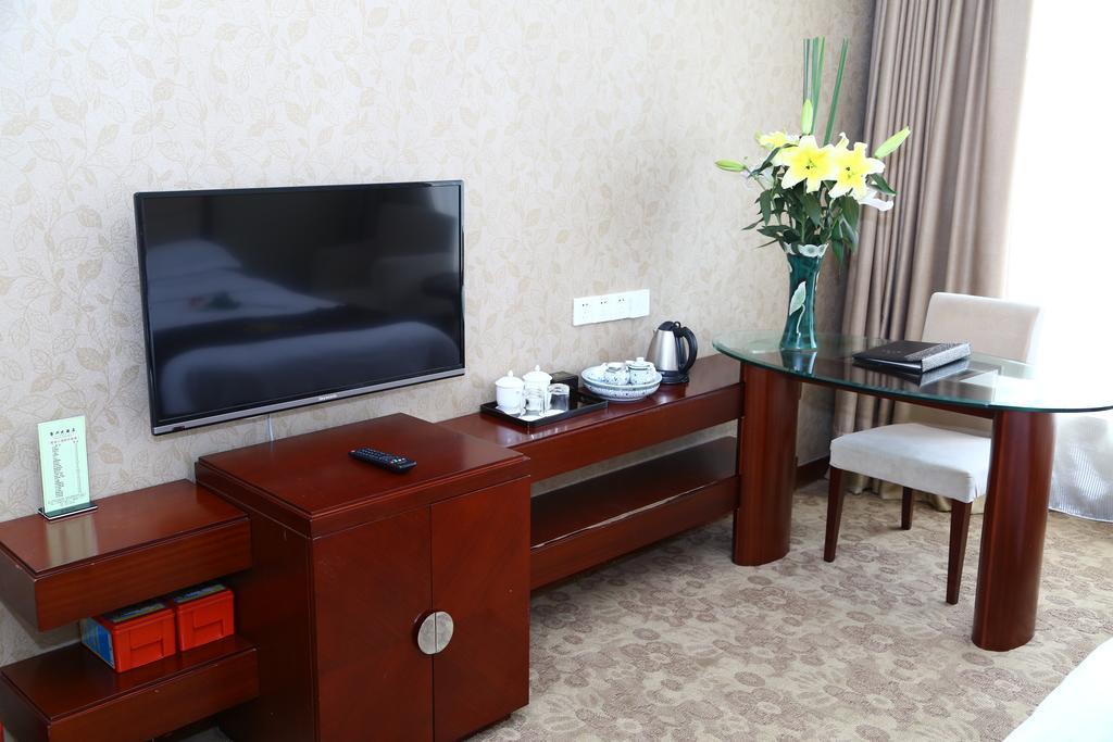 Long Zhou Grand Hotel Guangzhou Rum bild