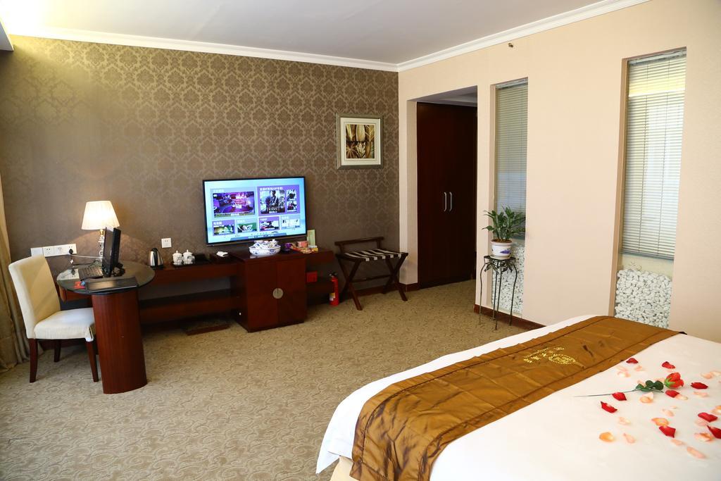 Long Zhou Grand Hotel Guangzhou Rum bild